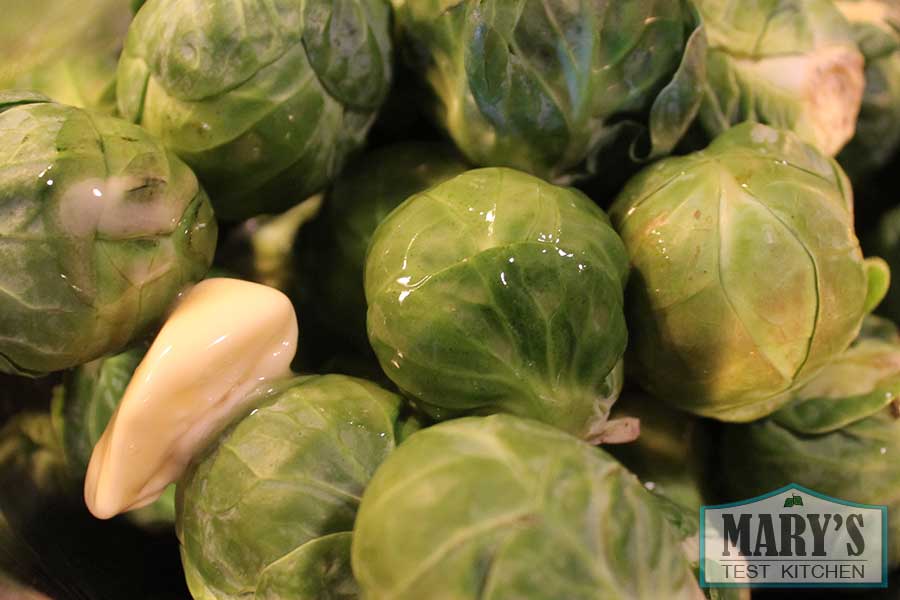 raw brussels sprouts with a dollop of Earth Balance butter