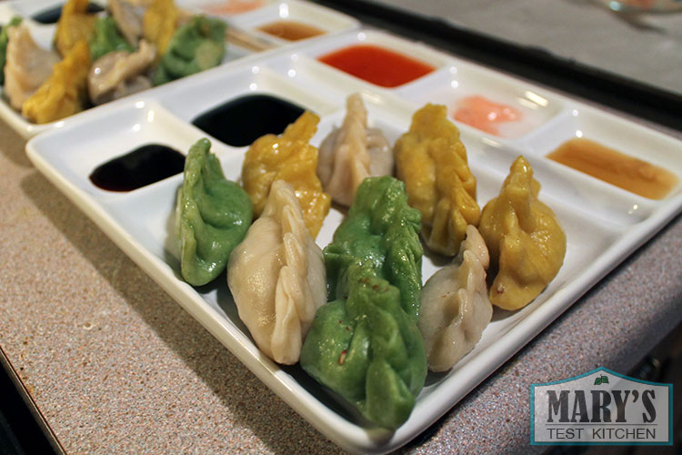 plate of tri-color dumplings