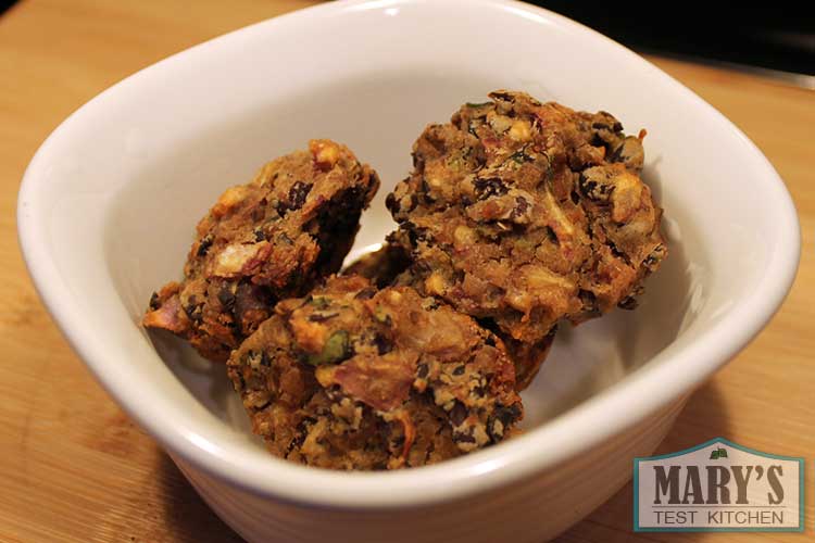 Three baked black bean falafel in bowl