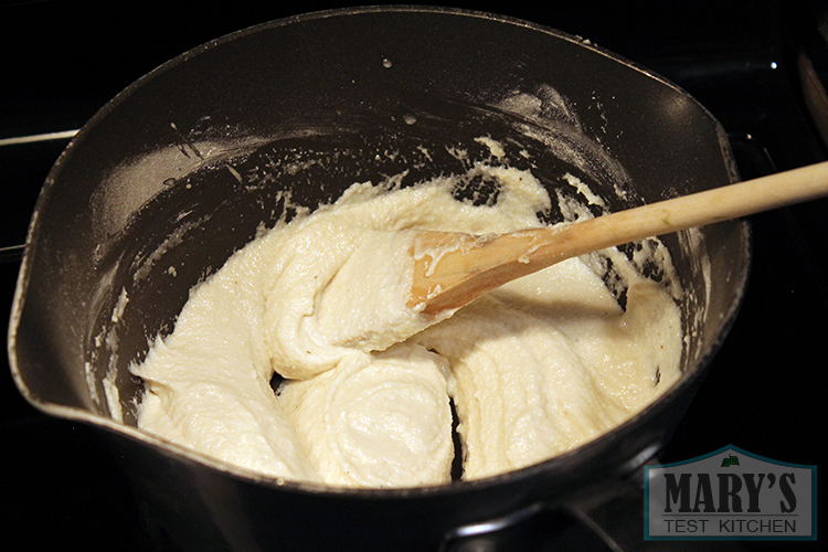 cooking cashew mozzarella on the stove