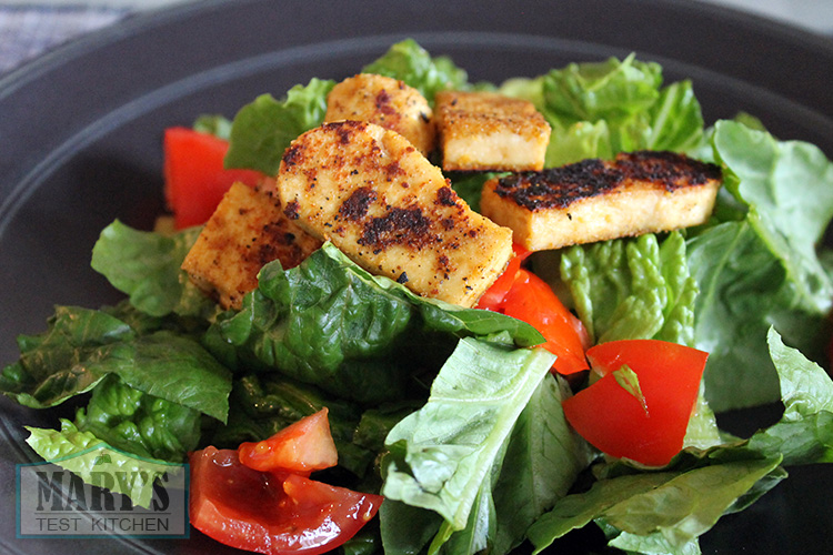 Charred five spice tofu on salad