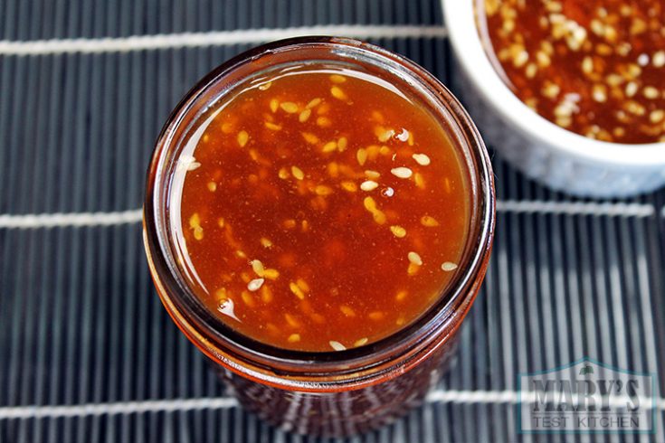 finished vegan honey garlic sesame sauce in mason jar