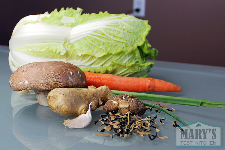 The raw ingredients: napa cabbage, mushrooms, carrot, scallion, garlic and ginger.