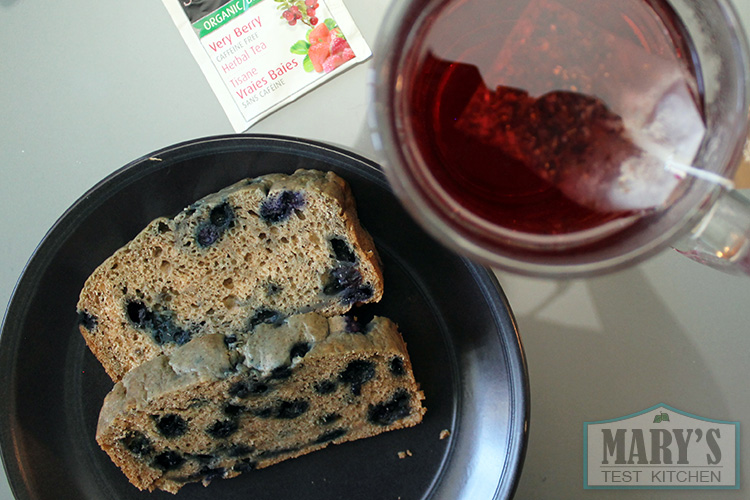2 blueberry cake slices and berry herbal tea