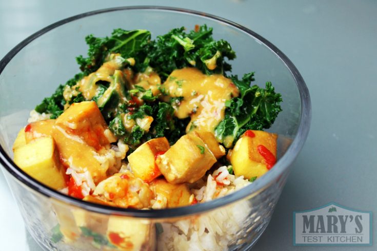 baked tofu cubes with kale on rice