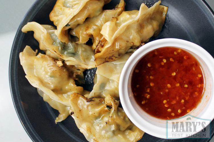 vegan potstickers with sweet and spicy sauce