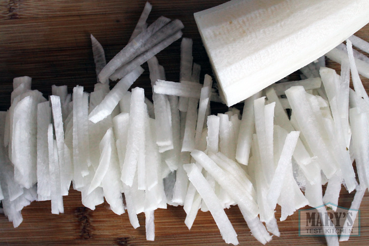 Peeled daikon, partly chopped into matchsticks