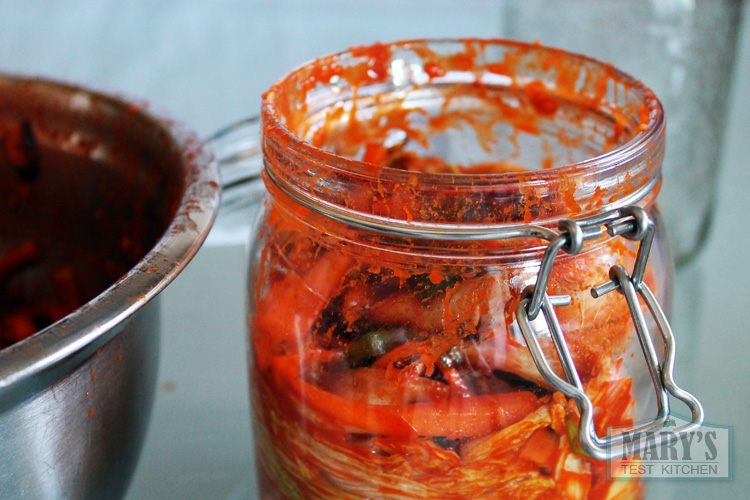 Jarring is also a messy affair. Gloves to the rescue once more. jar of freshly made vegan kimchi