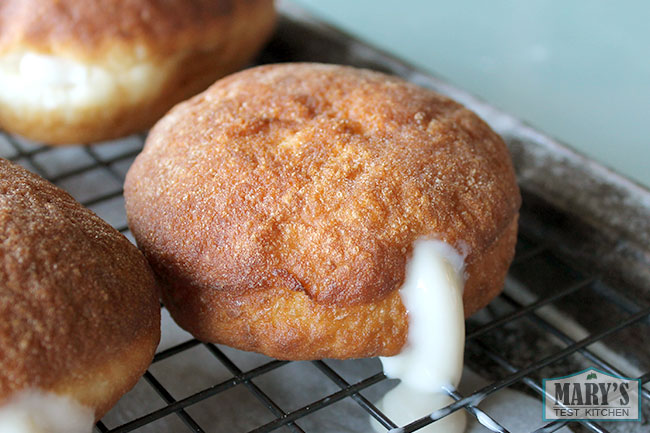 leaking unglazed cream filled doughnut