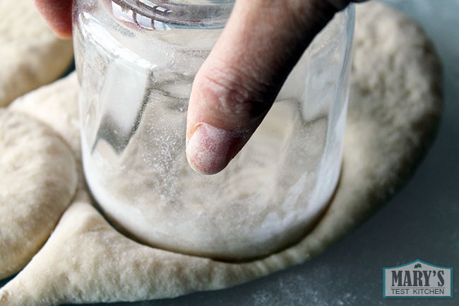 cutting round out of dough