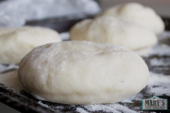 puffy risen doughnut dough rounds