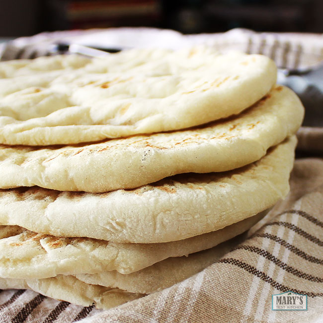 cooked easy vegan naan bread stack