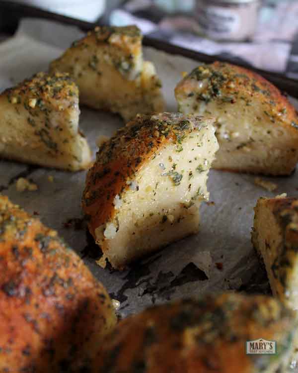 Vegan Korean six sided cream cheese garlic bread bun separated into wedges