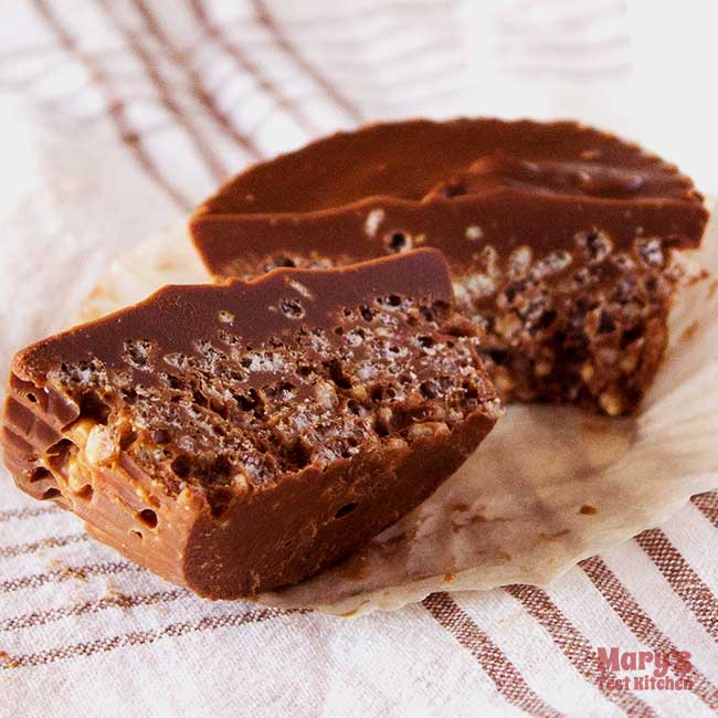 chocolate peanut butter cereal treat cut in half