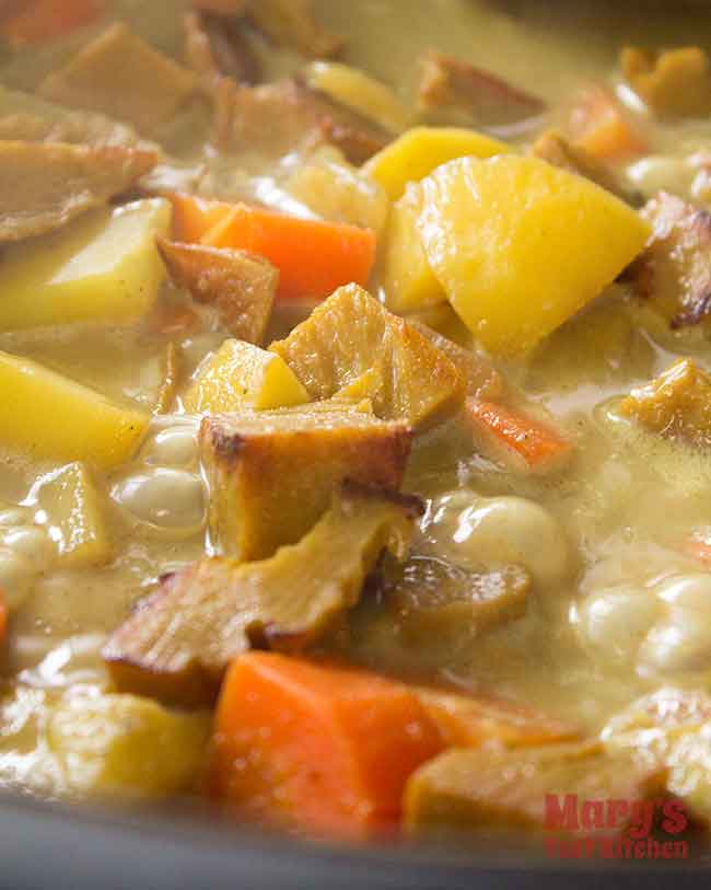 Vegan Coconut Curry Chicken bubbling close up