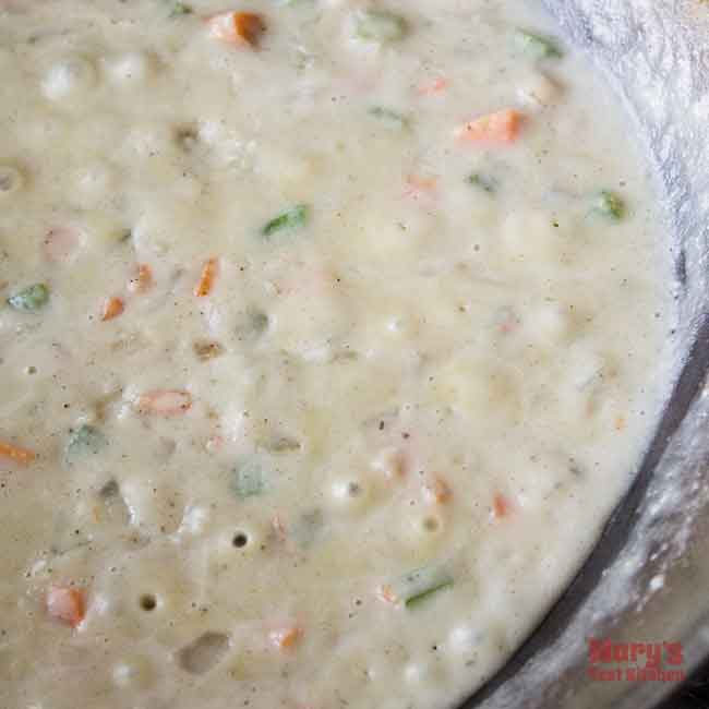 simmering creamy vegan chicken pot pie filling simmering