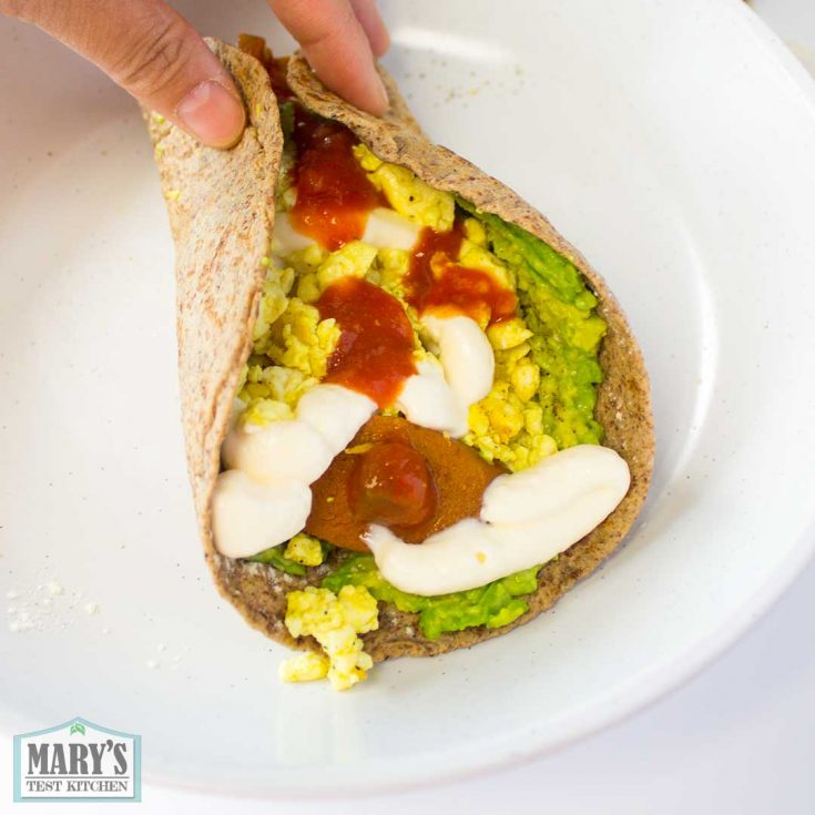 vegan hot dog scramble wrap pinched closed