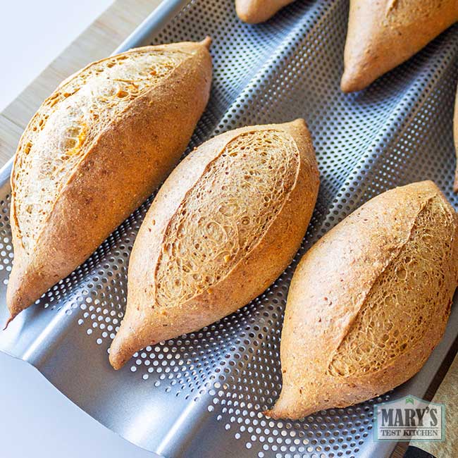 baked vegan keto sandwich rolls in baguette pan