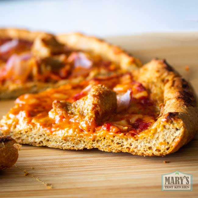 vegan keto pizza slice showing bread texture