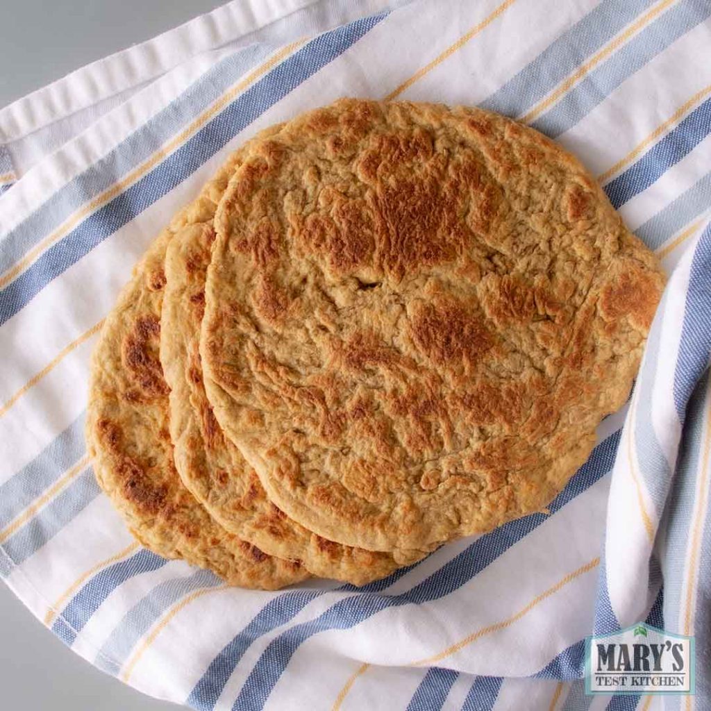 stack of vegan keto pita bread in a cloth