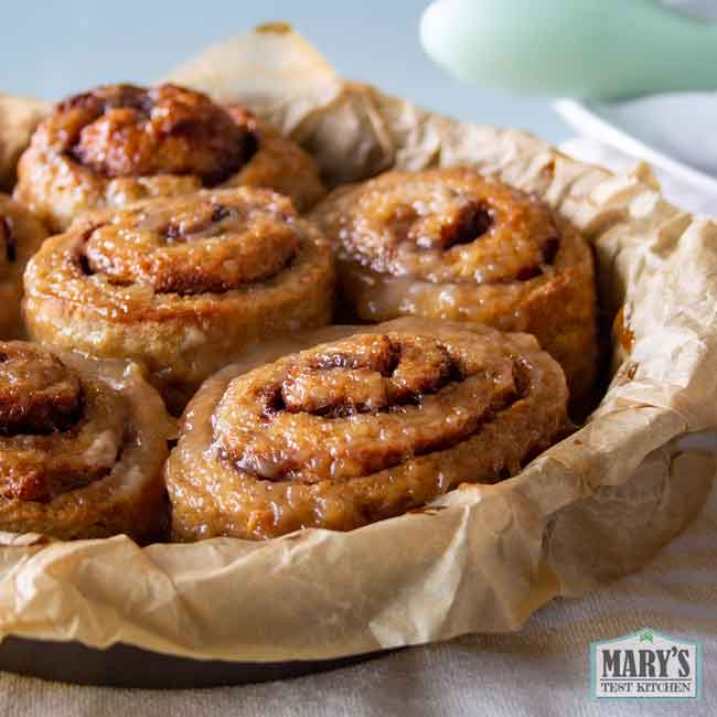 sticky baked vegan keto cinnamon rolls in pan