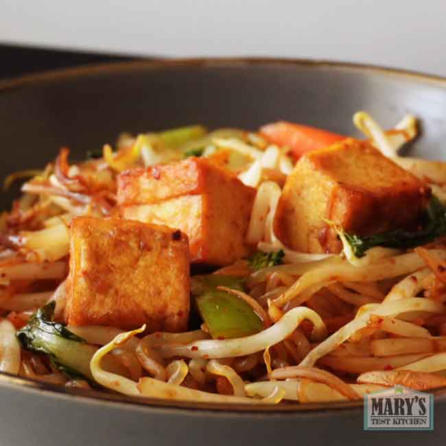 stir fried split pea tofu with noodles and bean sprouts