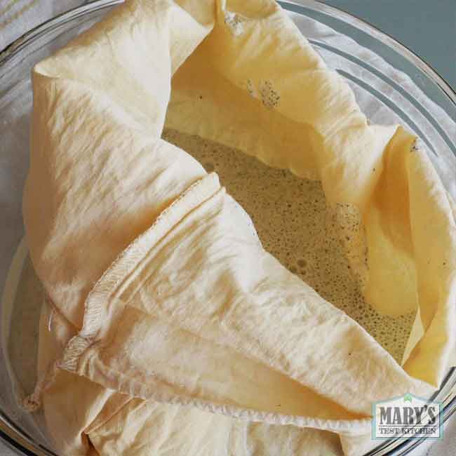 nut milk bag full of hemp heart puree