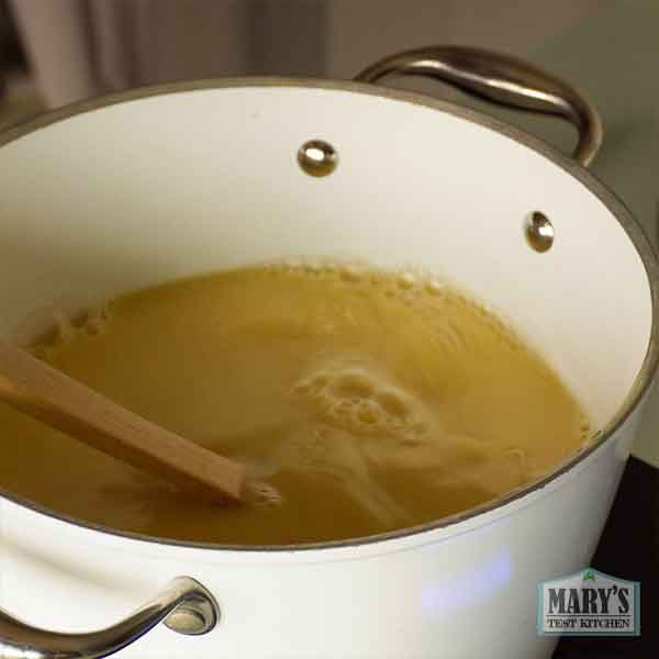 pigeon pea milk simmering in pot