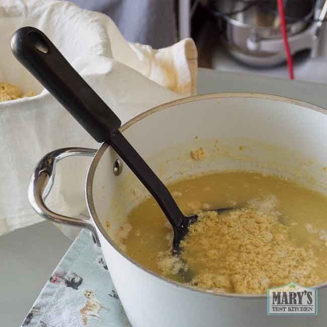 pot of chickpea curds in whey