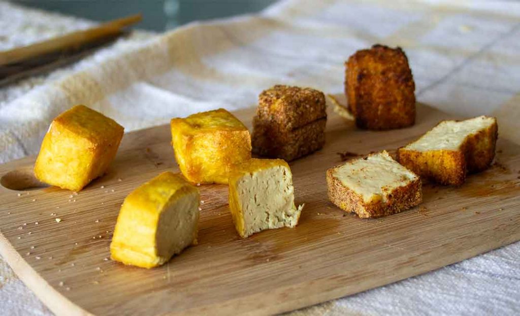 cut cubes of seasoned and air fried pigeon pea tofu