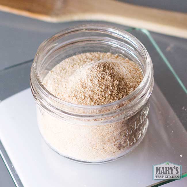 milled and sifted toasted chickpea fiber flour in jar