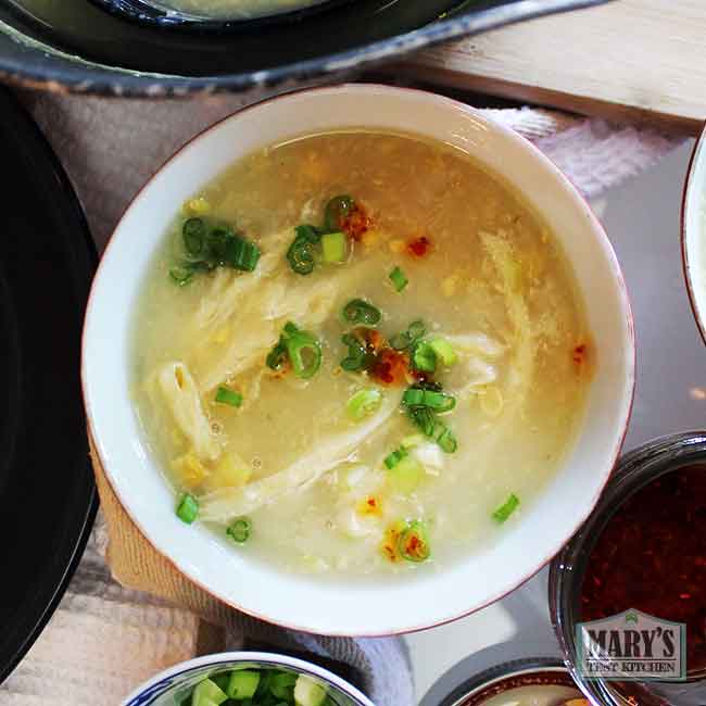 bowl of chinese egg drop soup with cream corn