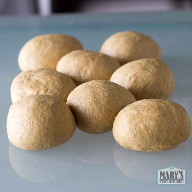 risen balls of vegan keto naan dough