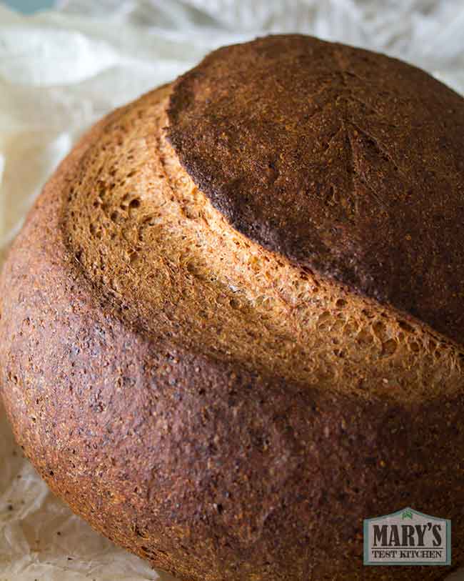slightly charred ear of the vegan keto sourdough loaf