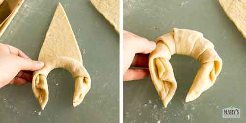 roll up triangle while encouraging crescent shape