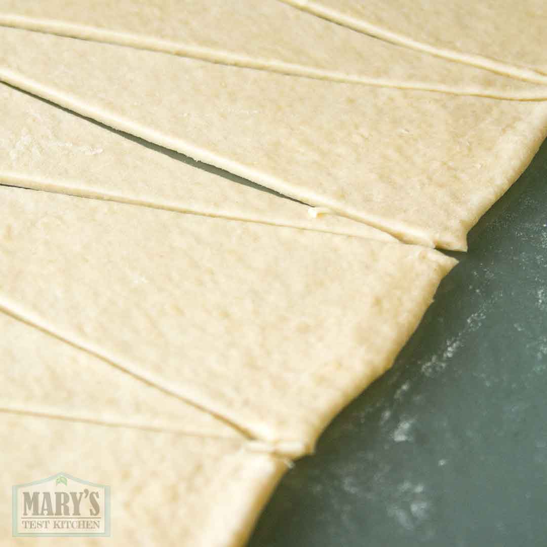 cut triangles of vegan easy croissant dough