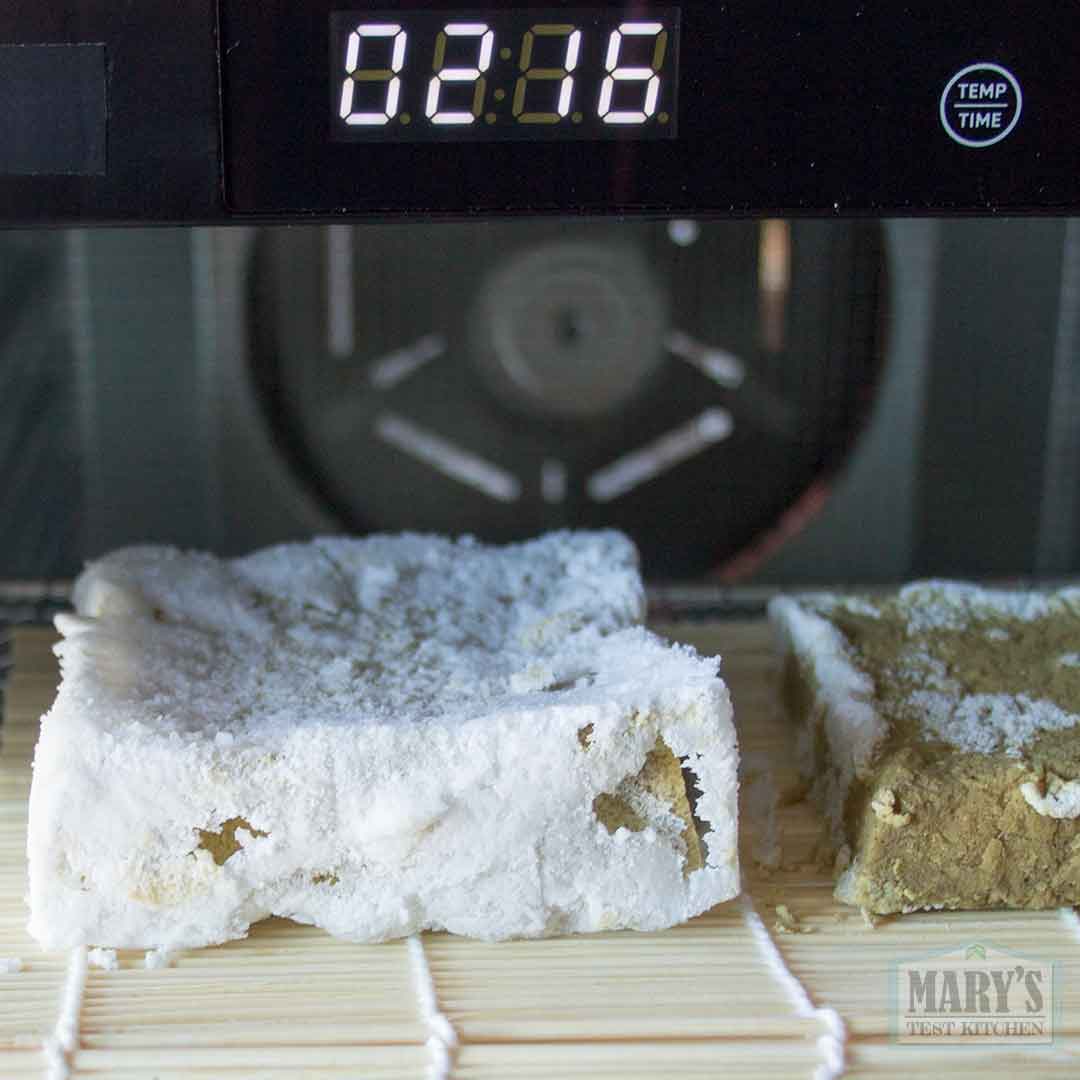 salt-encrusted pistachio cheese after 22 hours in the dehydrator