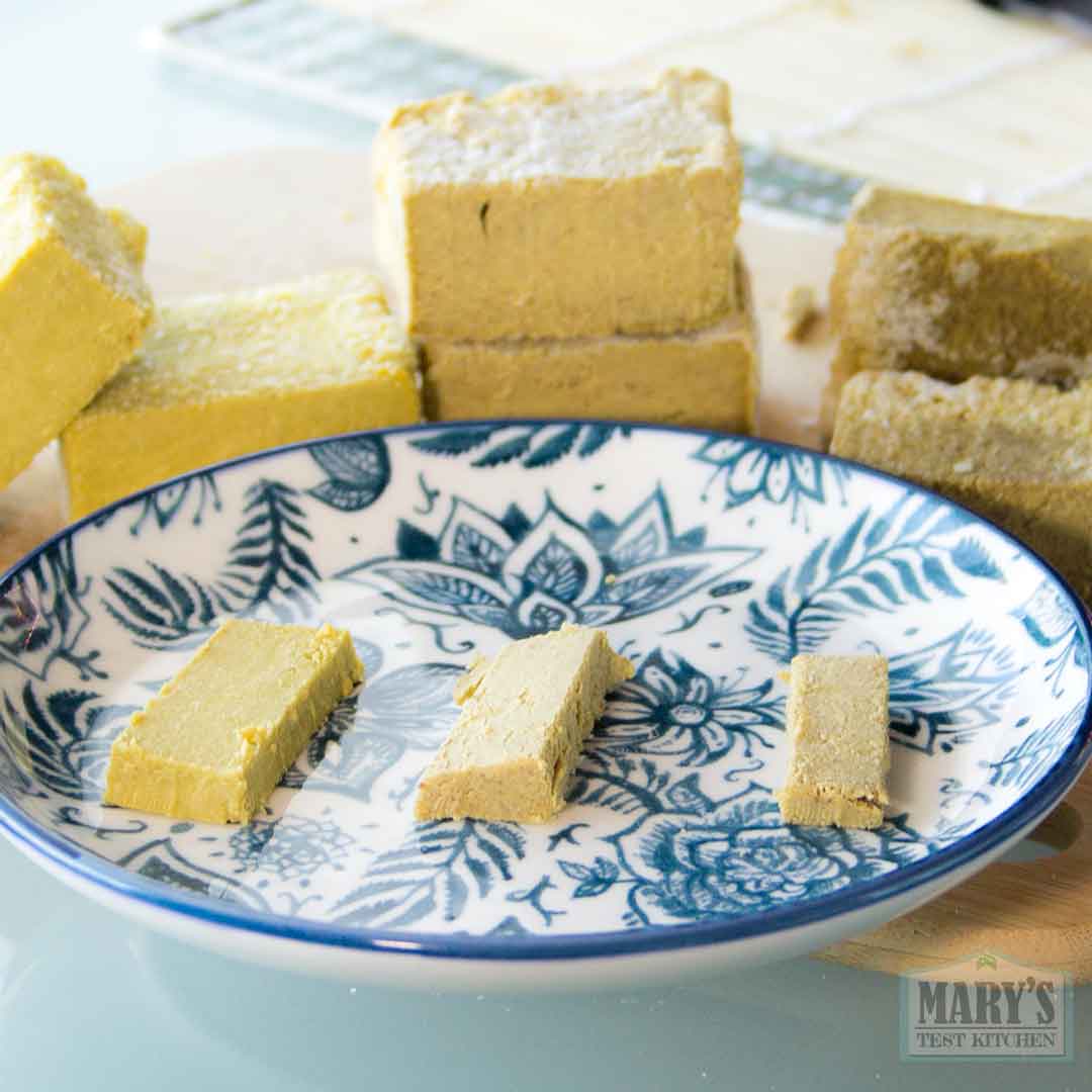 tasting slices of 44 hour dehydrated pistachio cheeses