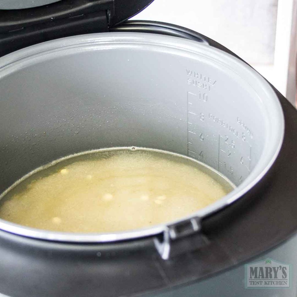 lentils, rice and water in rice cooker