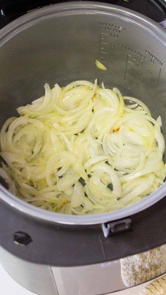 onions sauteing in rice cooker