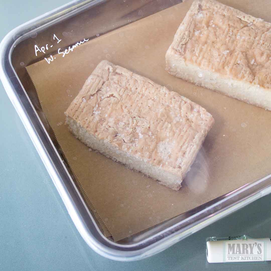 white sesame cheese sliced in half and boxed for the fridge