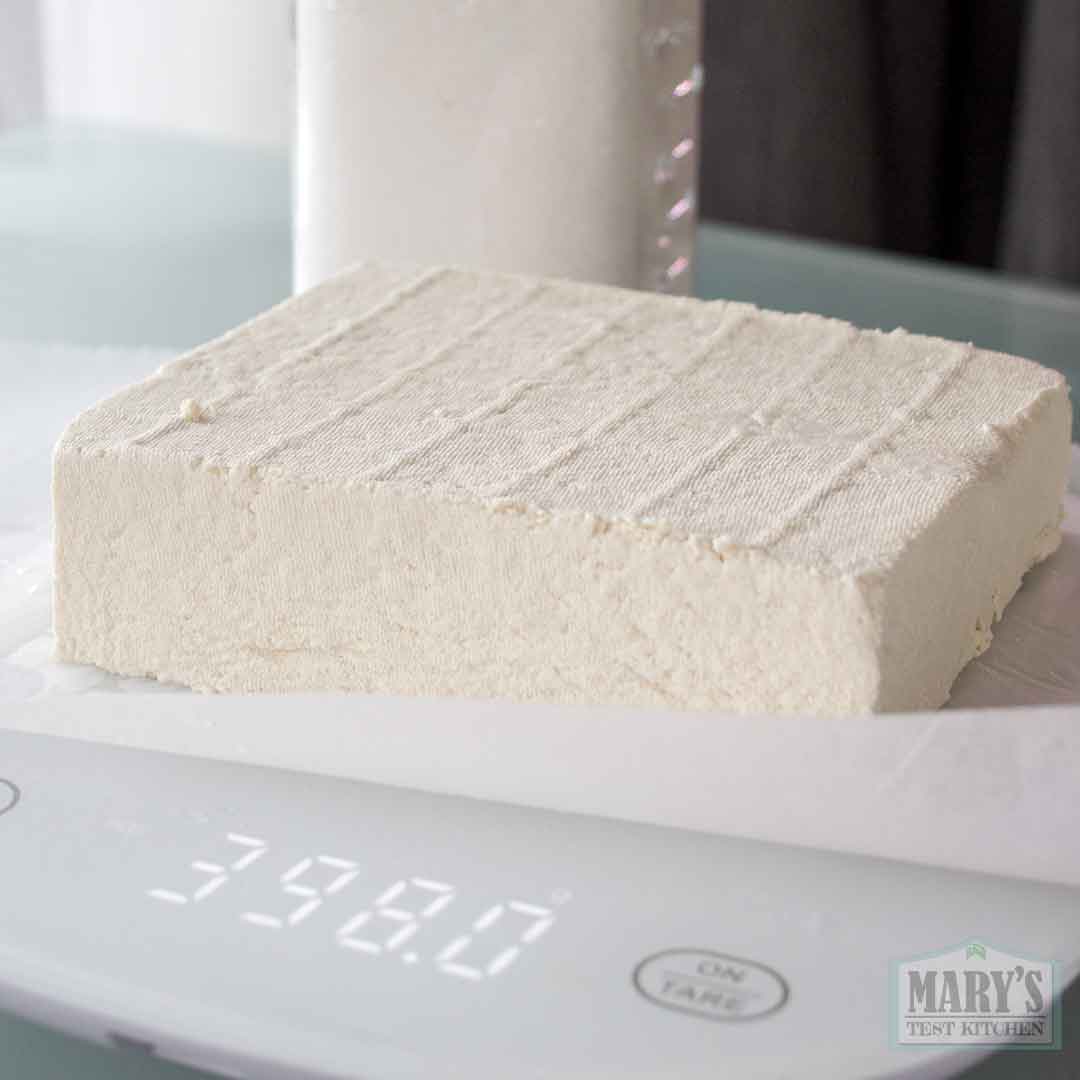 fresh pressed sesame cheese weighing 398 grams